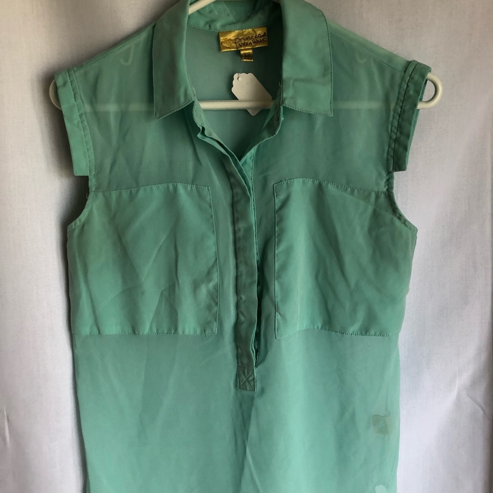 Shear sleeveless top